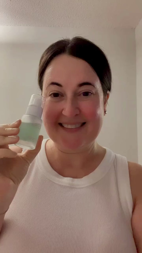 Jennie Fresa showing how to use the prebiotic skin barrier repair face essence by The Sixth House